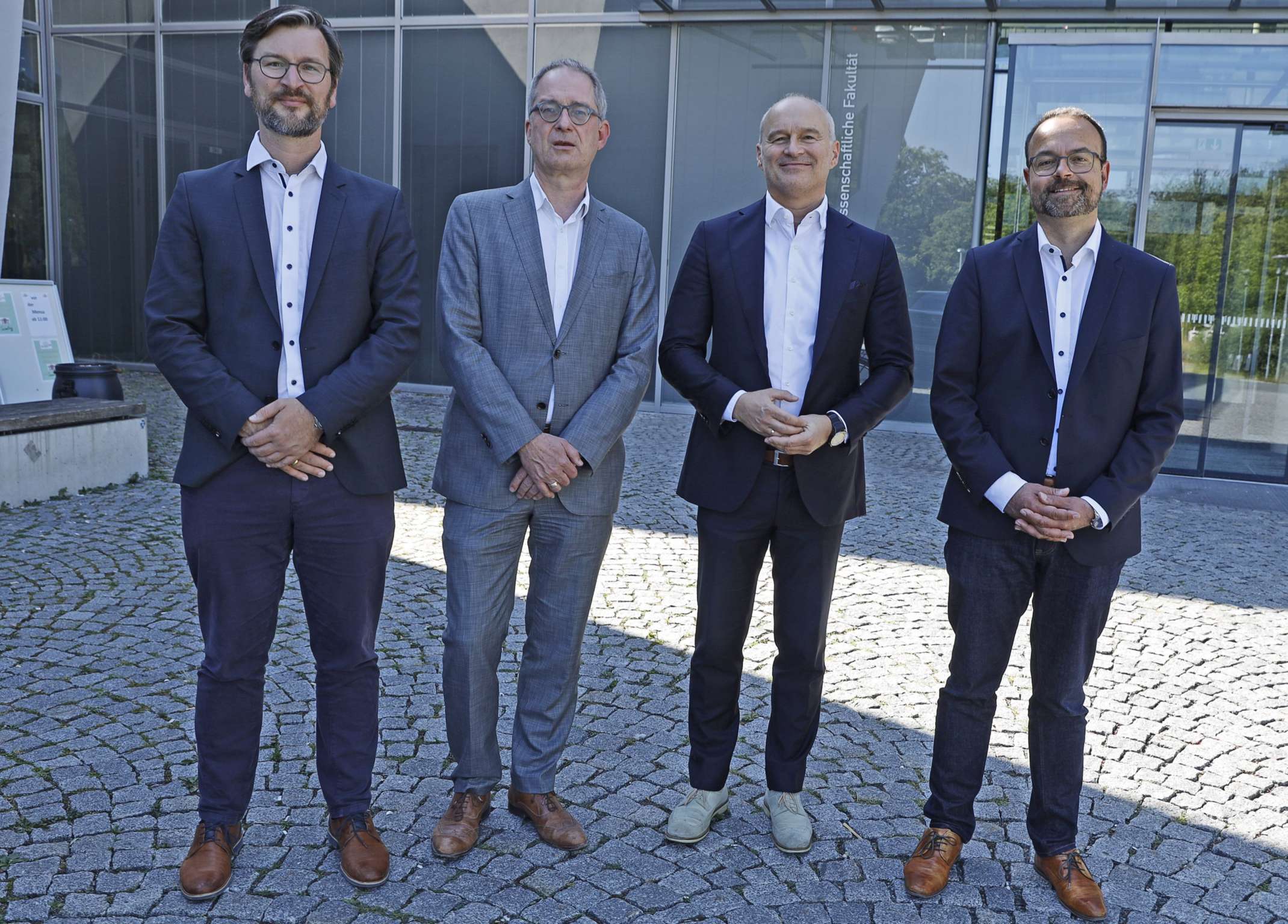 Eröffnung FIM mit Prof. Dr. Maximilian Röglinger, Prof. Dr. Stefan Leible, Prof. Dr. Dr. h.c. Gordon T. Rohrmair, und Prof. Dr. Björn Häckel