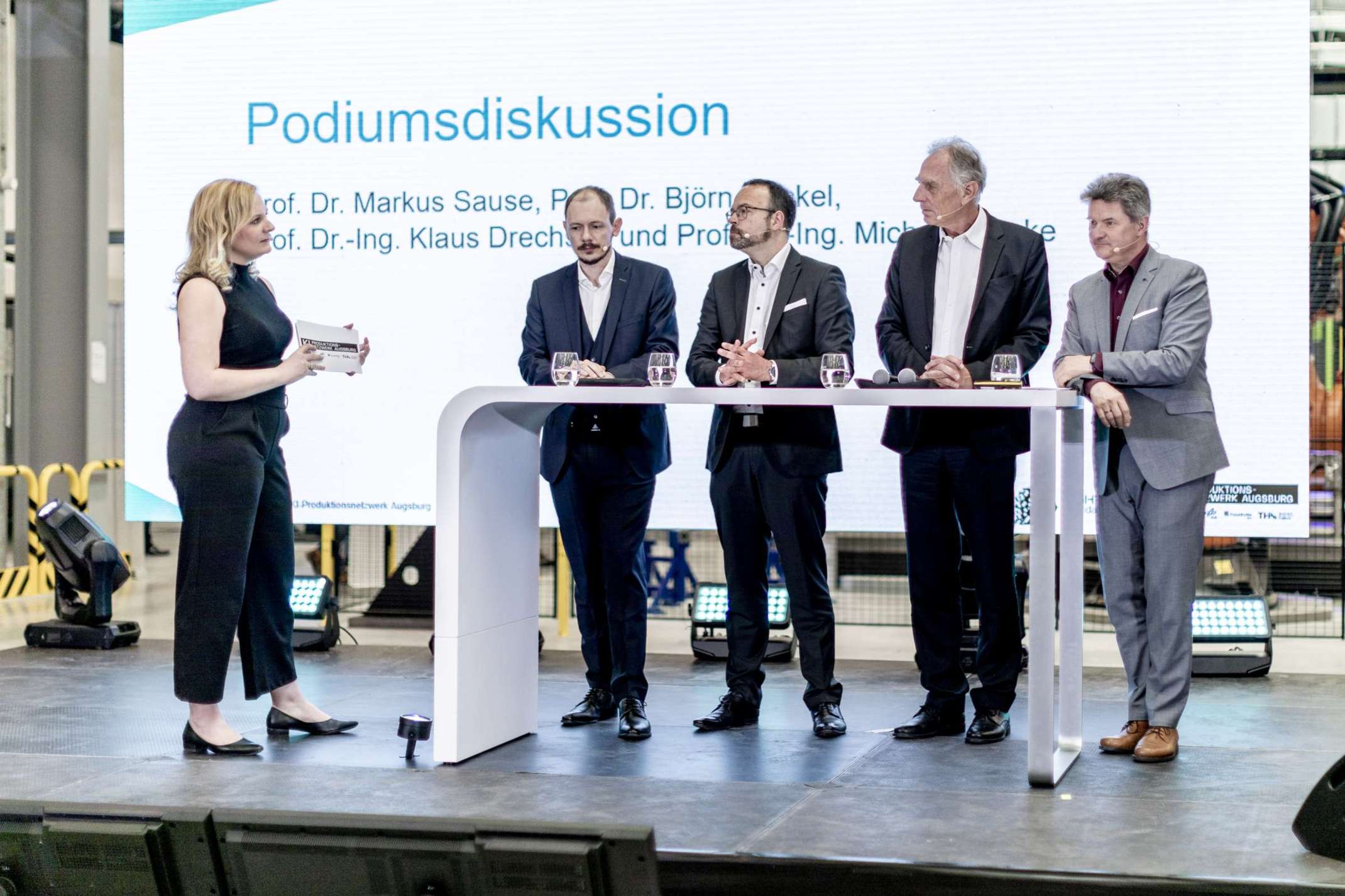 Die Leiter der vier Partner bei der Podiumsdiskussion