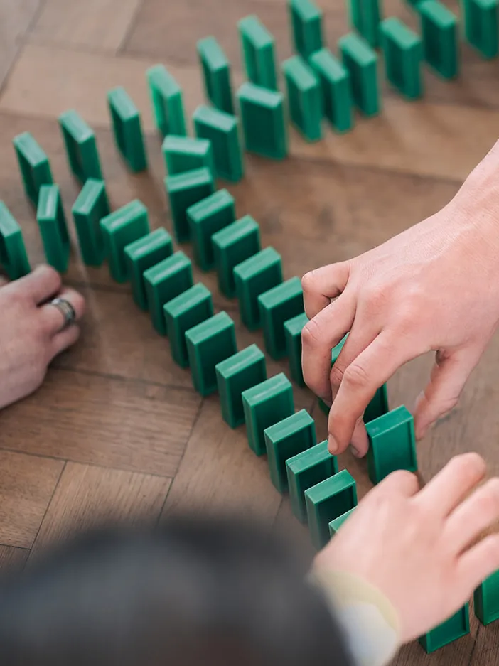 Hands that put building blocks together