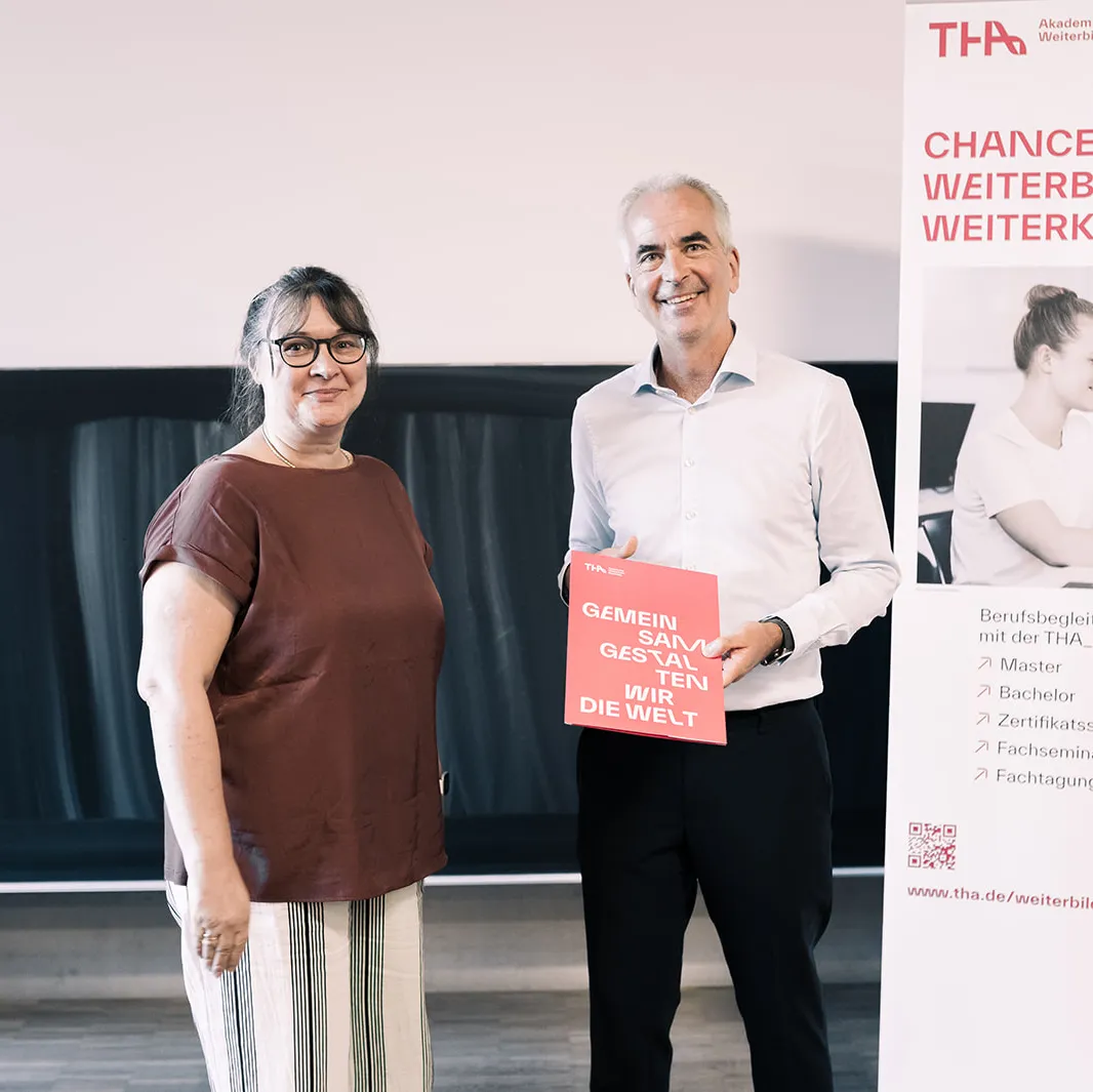 Graduate Tatjana Kuzmin with Prof. Dr. Clemens Espe at the graduation ceremony